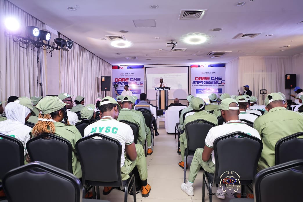 Corps members seated at a Foundation motivational talk for young people