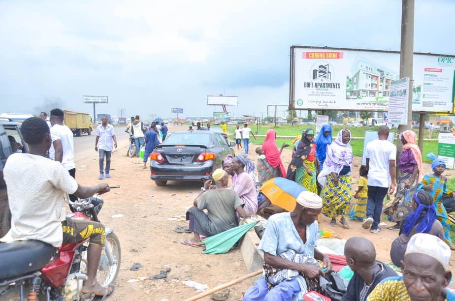 People gathered along the roadside during a Foundation street outreach