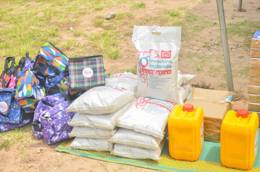 Foodstuff and household items laid out before distribution